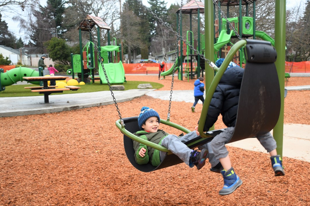 EC-Hughes-double-swing-kids-laughing-new-playground-west-seattle